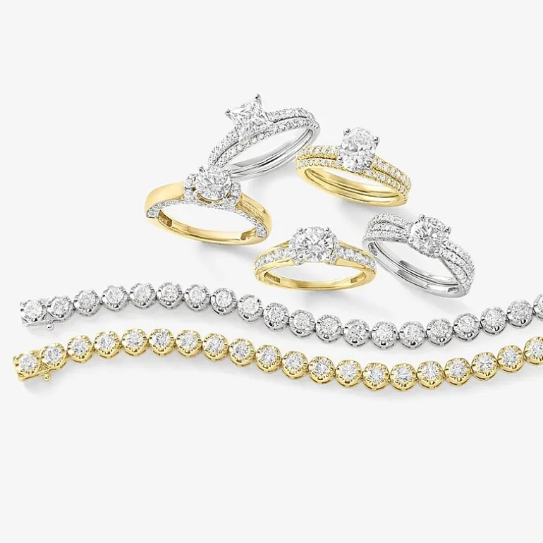 (H-I / Si2-I1) Womens 1 1/2 CT. T.W. Lab Grown White Diamond 10K or 14K Gold Oval Side Stone Bridal Set