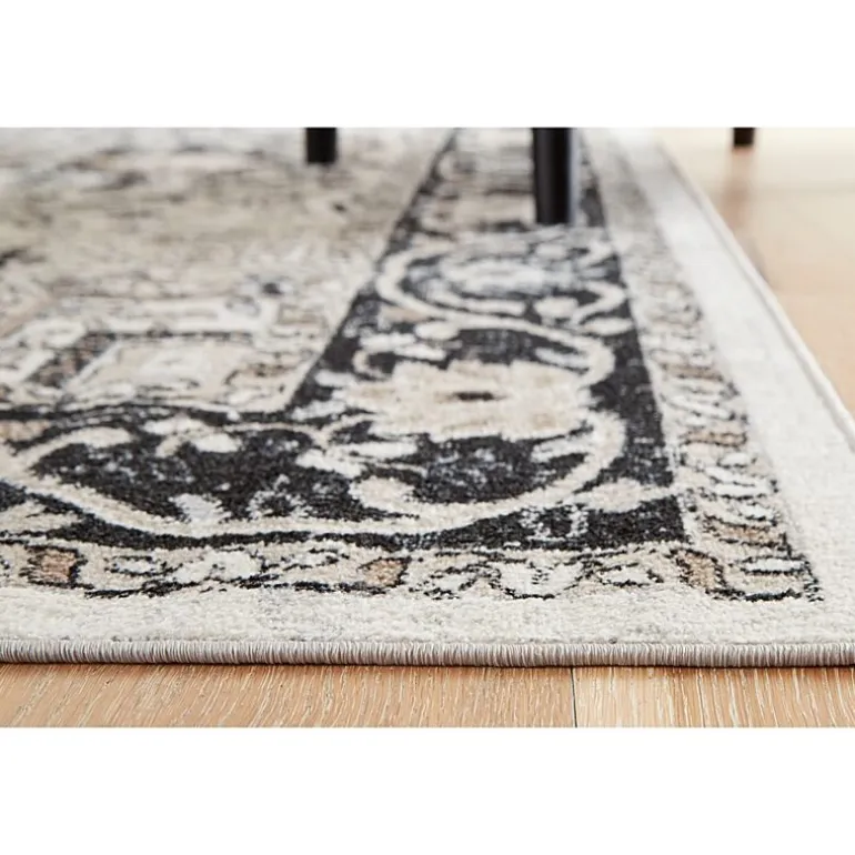 Signature Design by Ashley® Gregmoore Washable Indoor Rectangular Area Rug